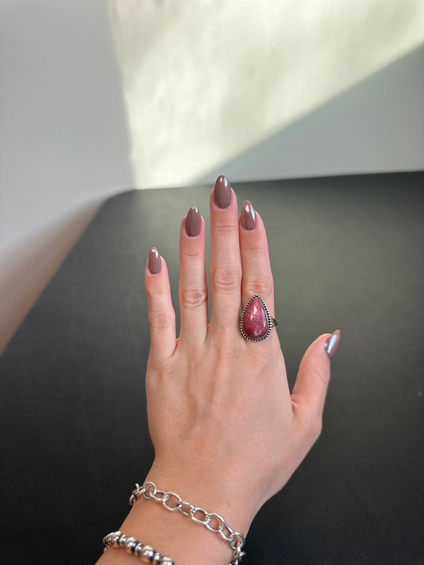 Pear shaped thulite ring