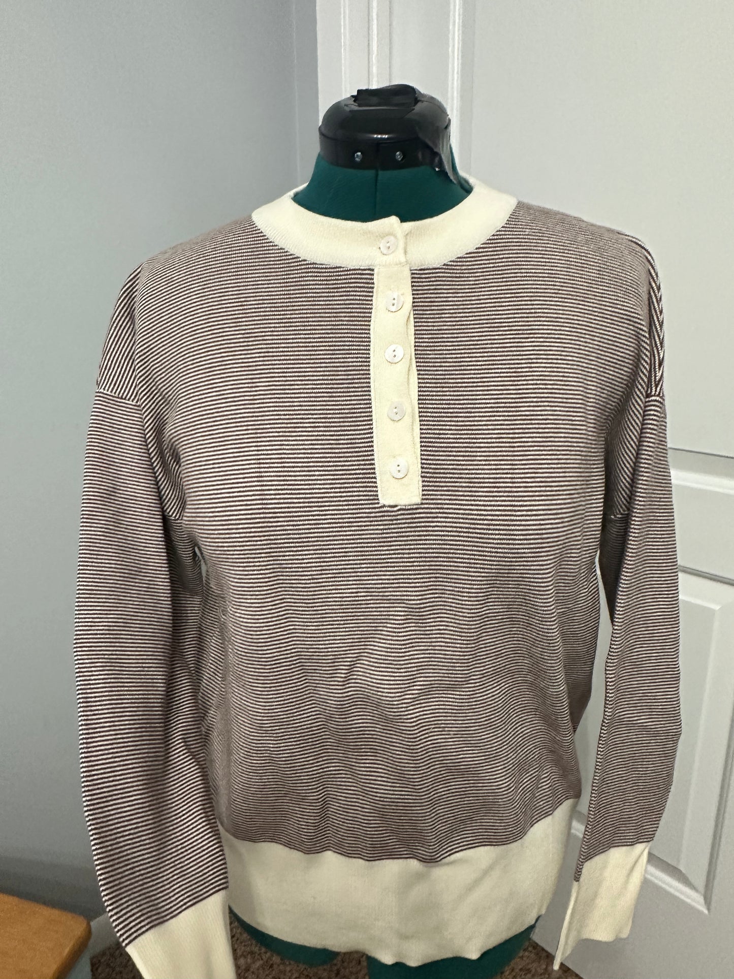 Striped contrast half button knit top
