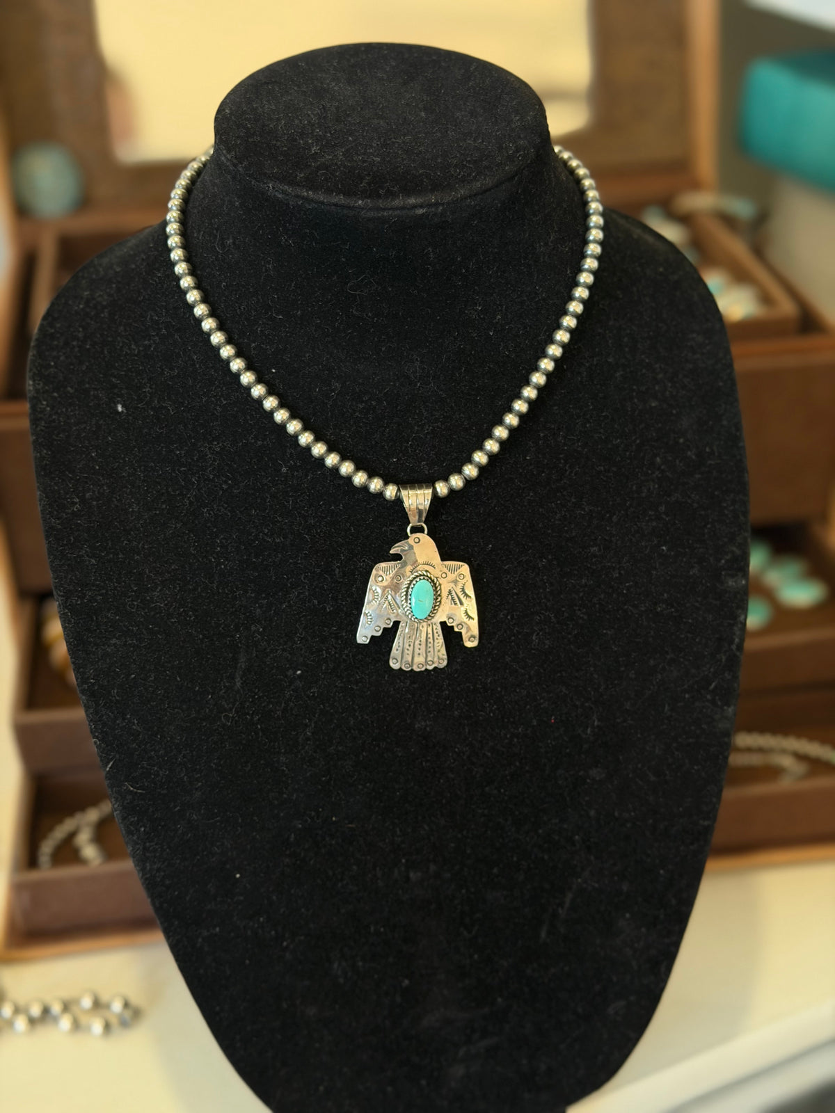 Kingman turquoise thunderbird pendant