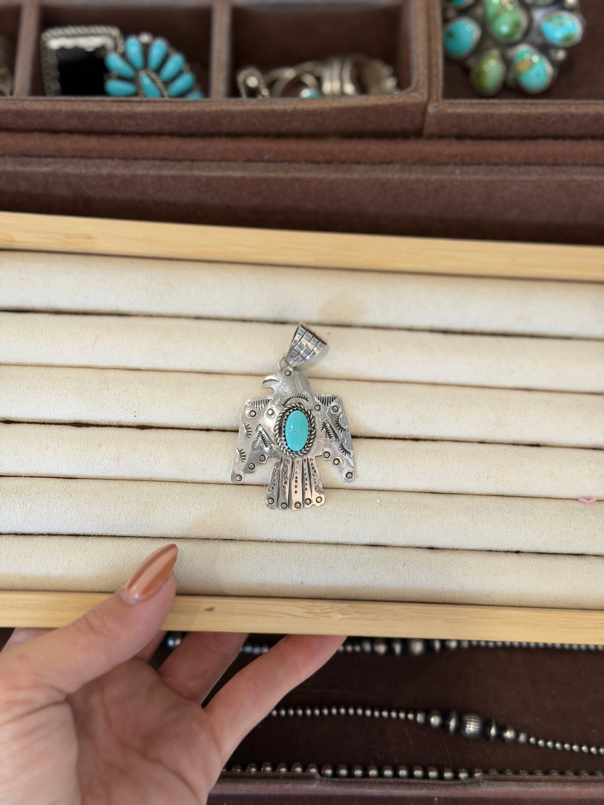 Kingman turquoise thunderbird pendant
