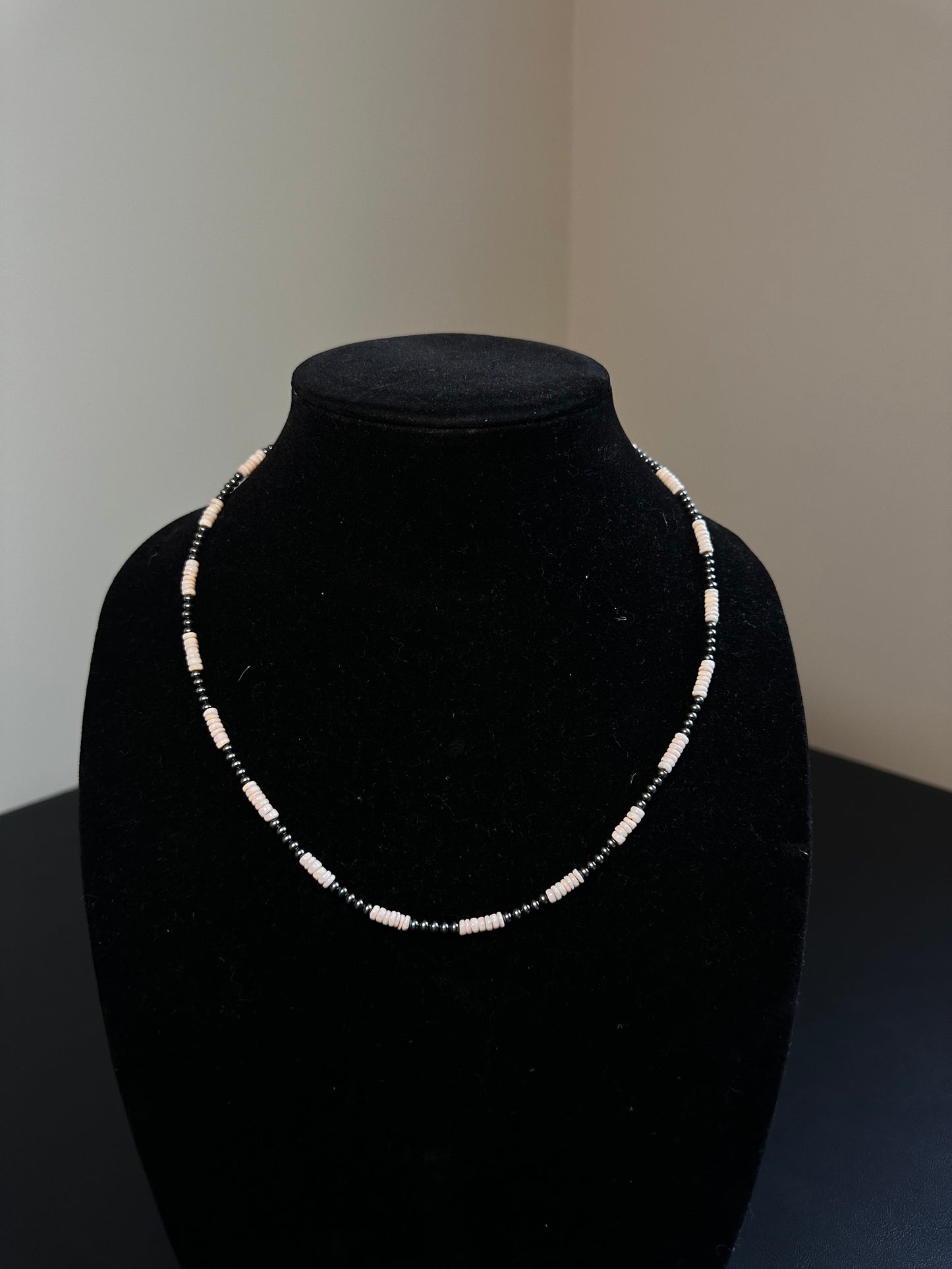 Pink conch and Navajo pearl necklace