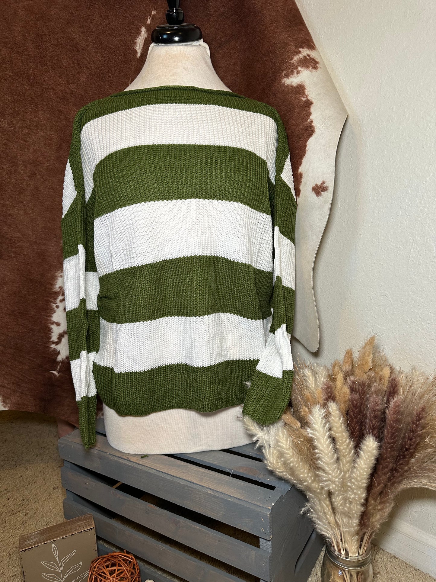 Green and white sweater